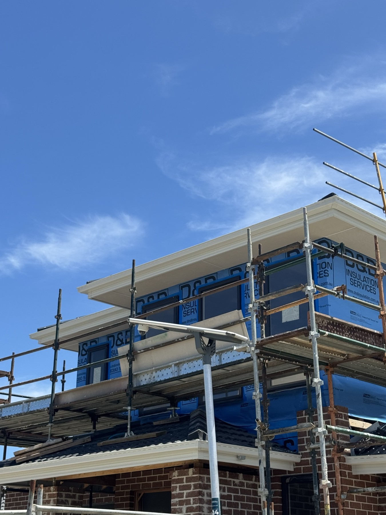 Scaffolding around a two storey home during construction